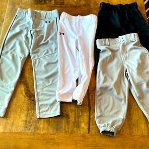 Bundle Boys size small baseball pants. Two under armour and two Rawlings brand.